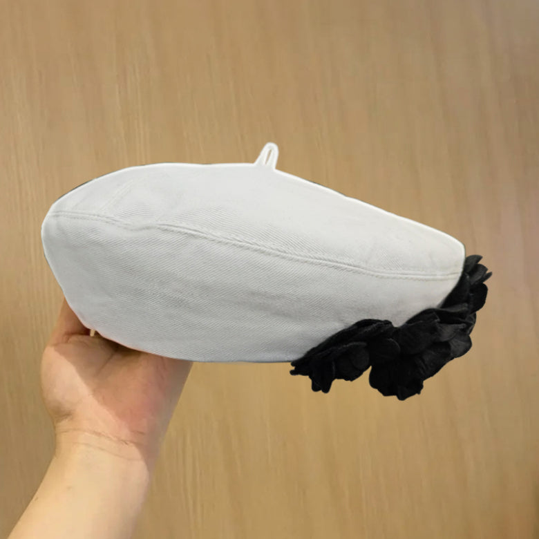 A Fashionable And Fluffy Painter's Hat That Makes Your Face Look Good